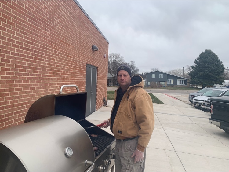 Craig Ward grilling burgers